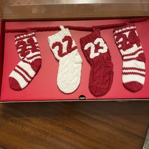 Pottery Barn Garland Calendar knit stocking garland.  Brand new